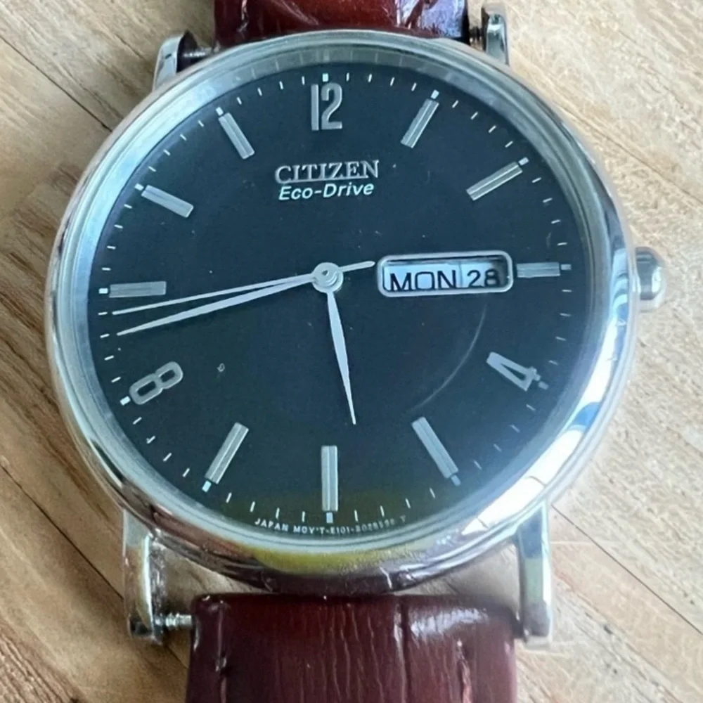 Citizen eco-drive black dial silver tone brown leather dress watch